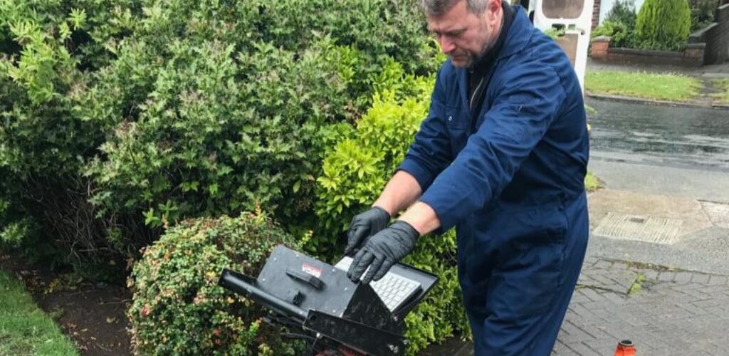 Engineer performing CCTV drain survey in Liverpool